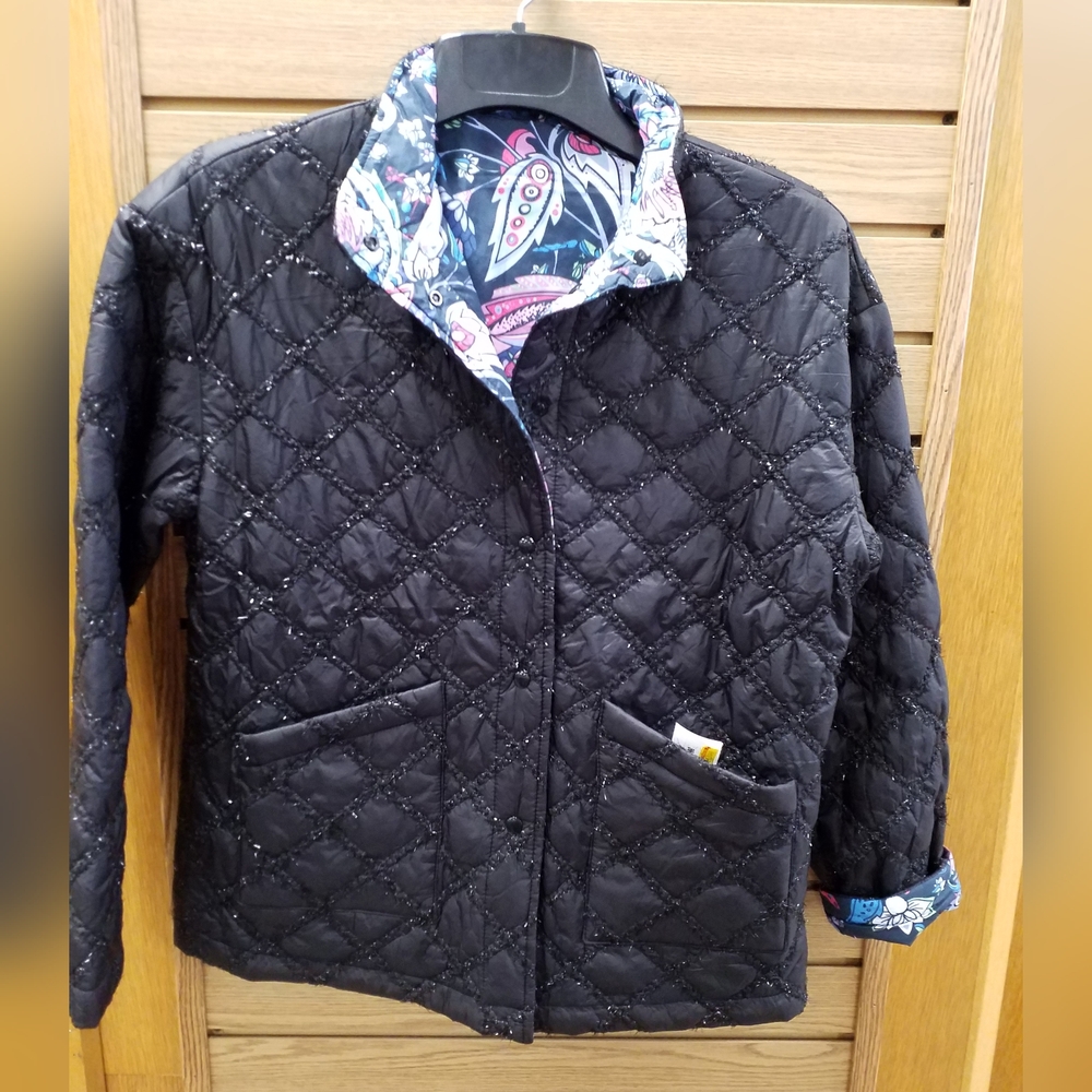 Light weight jacket with lots of sparkle.